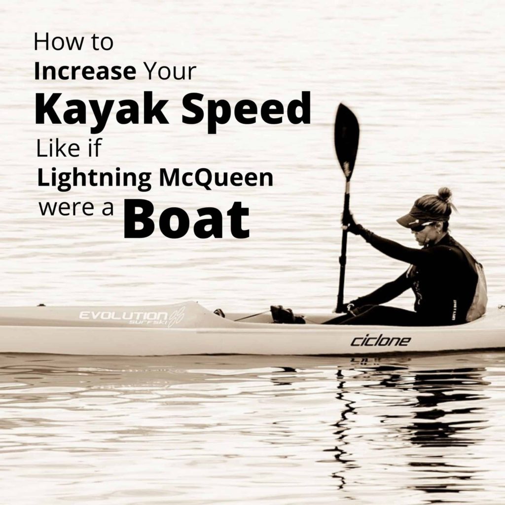 Female kayaker paddling fast
